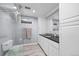 Sleek bathroom with glass-enclosed shower, modern vanity, and elegant fixtures at 2069 E 116Th Ave, Northglenn, CO 80233