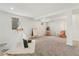 Bright, finished basement featuring neutral carpeting, recessed lighting, and space for relaxing and playing at 11021 Otis St, Westminster, CO 80020