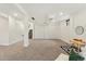 Spacious finished basement with carpet flooring, storage, and recreational space at 11021 Otis St, Westminster, CO 80020