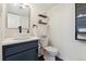 Modern half bathroom features stylish vanity and sink at 11021 Otis St, Westminster, CO 80020