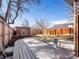 Relaxing backyard featuring outdoor seating with a large wooden table at 2635 N Clayton St, Denver, CO 80205