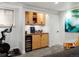 Finished basement featuring a wet bar, exercise equipment and extra space to relax at 2635 N Clayton St, Denver, CO 80205