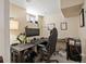 Modern office space featuring black desk and ergonomic chair in a well-lit room at 2635 N Clayton St, Denver, CO 80205