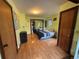 Bright bedroom with wood floors, closet, and ample natural light at 274 Lincoln Dr, Idaho Springs, CO 80452