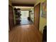 Entryway with wood floors and a view of the sunroom and deck at 274 Lincoln Dr, Idaho Springs, CO 80452