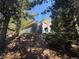 Charming exterior view of home featuring a wood balcony, siding, and landscaping at 274 Lincoln Dr, Idaho Springs, CO 80452