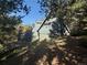 Exterior of home with a wood balcony and siding at 274 Lincoln Dr, Idaho Springs, CO 80452