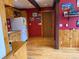 Cozy kitchen with wood cabinets, stainless steel appliances, and an adjacent dining area, perfect for entertaining at 274 Lincoln Dr, Idaho Springs, CO 80452