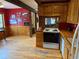 Well-lit kitchen with plenty of storage and adjacent view into another room at 274 Lincoln Dr, Idaho Springs, CO 80452