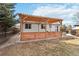 Spacious backyard featuring a wooden pergola, offering a cozy outdoor living space at 5402 Sweet Grass Ct, Castle Rock, CO 80109