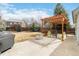 Large backyard with a pergola covered patio and seating area, great for outdoor entertaining at 5402 Sweet Grass Ct, Castle Rock, CO 80109