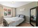 Comfortable bedroom with a window view and a modern color scheme at 5402 Sweet Grass Ct, Castle Rock, CO 80109