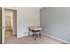 Functional bedroom space with a desk setup, ideal for a home office at 5402 Sweet Grass Ct, Castle Rock, CO 80109