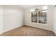 Simple bedroom featuring large window and plush carpeting at 1535 S Florence Way # 407, Aurora, CO 80247