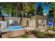 Backyard spa/shed with relaxing hot tub, garden, and modern design at 2324 S Columbine St, Denver, CO 80210