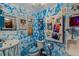 Ice-themed bathroom with unique blue decor, including a mini fridge at 2324 S Columbine St, Denver, CO 80210