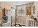 A well-lit bathroom with checkered floors, white shower, and decorative wallpaper at 2324 S Columbine St, Denver, CO 80210