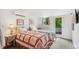 Twin bedroom featuring dual beds and access to an outdoor balcony at 2324 S Columbine St, Denver, CO 80210