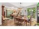 Bright dining room with hardwood floors, and view to a kitchen, perfect for Gathering meals at 2324 S Columbine St, Denver, CO 80210