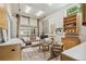 Finished garage featuring a lounge area, desk, and storage cabinets at 2324 S Columbine St, Denver, CO 80210