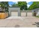 Exterior view of a detached three car garage with an oversized driveway at 2324 S Columbine St, Denver, CO 80210