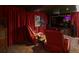 Cozy theater room with plush red seating, perfect for movie nights at 2324 S Columbine St, Denver, CO 80210