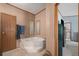 Bathroom featuring a garden tub at 8260 County Road 39, Fort Lupton, CO 80621