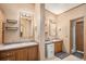 Spacious bathroom with a dual sink vanity at 8260 County Road 39, Fort Lupton, CO 80621