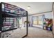 This bedroom offers a great view out of the large windows for your enjoyment at 8260 County Road 39, Fort Lupton, CO 80621
