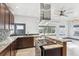 Modern kitchen features stainless appliances, granite counters, and stylish finishes at 1937 Jay St, Lakewood, CO 80214