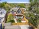 Aerial view of the property showcasing the backyard, garage, and the charming neighborhood at 4348 Umatilla St, Denver, CO 80211