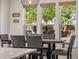 Dining area with a pendant light fixture and a view of the neighborhood at 4348 Umatilla St, Denver, CO 80211