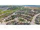 Expansive aerial view of a Primary-planned community, showcasing the neighborhood layout and surrounding landscape at 8261 Garden City Ave, Littleton, CO 80125