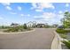 View of the community clubhouse with modern farmhouse architectural details at 8261 Garden City Ave, Littleton, CO 80125