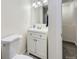 Cozy bathroom featuring white fixtures and a walk-in shower at 5712 S Lowell Blvd, Littleton, CO 80123