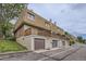 A row of townhomes with a deck above the garage on each unit at 5712 S Lowell Blvd, Littleton, CO 80123