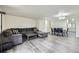 Spacious living room with hardwood floors and a comfortable seating arrangement at 5712 S Lowell Blvd, Littleton, CO 80123