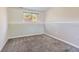 Bedroom with a window that offers a view of the outside at 13483 Achilles Dr, Lone Tree, CO 80124