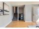 Entryway featuring hardwood floors, stairs to the upper level, and access to other rooms at 13483 Achilles Dr, Lone Tree, CO 80124