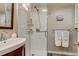 Updated bathroom showcasing a walk-in shower, vanity, and modern fixtures at 3525 N Alcott St, Denver, CO 80211