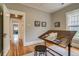 Bright bedroom with hardwood floors and a large drafting table at 3525 N Alcott St, Denver, CO 80211