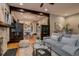 Inviting living room with hardwood floors and view to dining area at 3525 N Alcott St, Denver, CO 80211