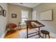 Study room featuring hardwood floors, natural light, and a vintage desk at 3525 N Alcott St, Denver, CO 80211