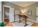 Study room featuring hardwood floors, natural light, and a vintage table and chair set at 3525 N Alcott St, Denver, CO 80211