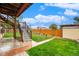 Lush backyard with stairs leading to a deck, providing a serene outdoor retreat at 8871 Rutgers St, Westminster, CO 80031