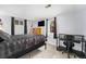 Bedroom with dark bedding, glass desk, and dark curtains at 8871 Rutgers St, Westminster, CO 80031
