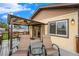 Cozy covered deck with comfortable seating, ideal for enjoying the outdoors year-round at 8871 Rutgers St, Westminster, CO 80031