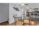 Charming dining area with stylish table and chairs, seamlessly connected to the kitchen at 8871 Rutgers St, Westminster, CO 80031