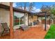 Charming brick patio with covered seating area, perfect for outdoor gatherings and relaxation at 8871 Rutgers St, Westminster, CO 80031