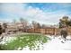 Landscaped backyard with artificial turf, providing a low-maintenance space at 2652 S Sable Way, Aurora, CO 80014